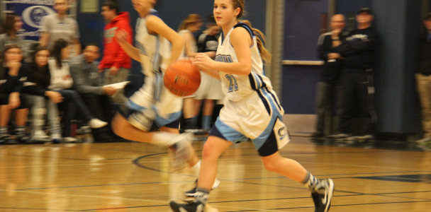 Sophomore Moriah Luthy takes the ball down the court.