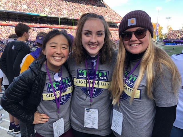 Before the COVID-19 pandemic Emma Song, left, smiles at a football game with friends during her freshman year of college.