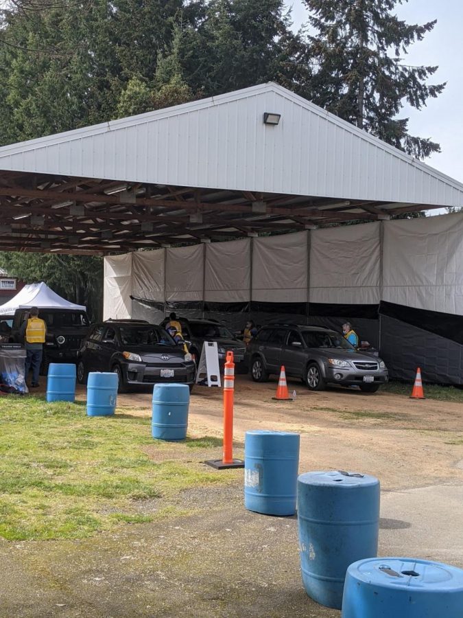 Vaccine clinic tent set up by local volunteers at the Lacey fairgrounds.