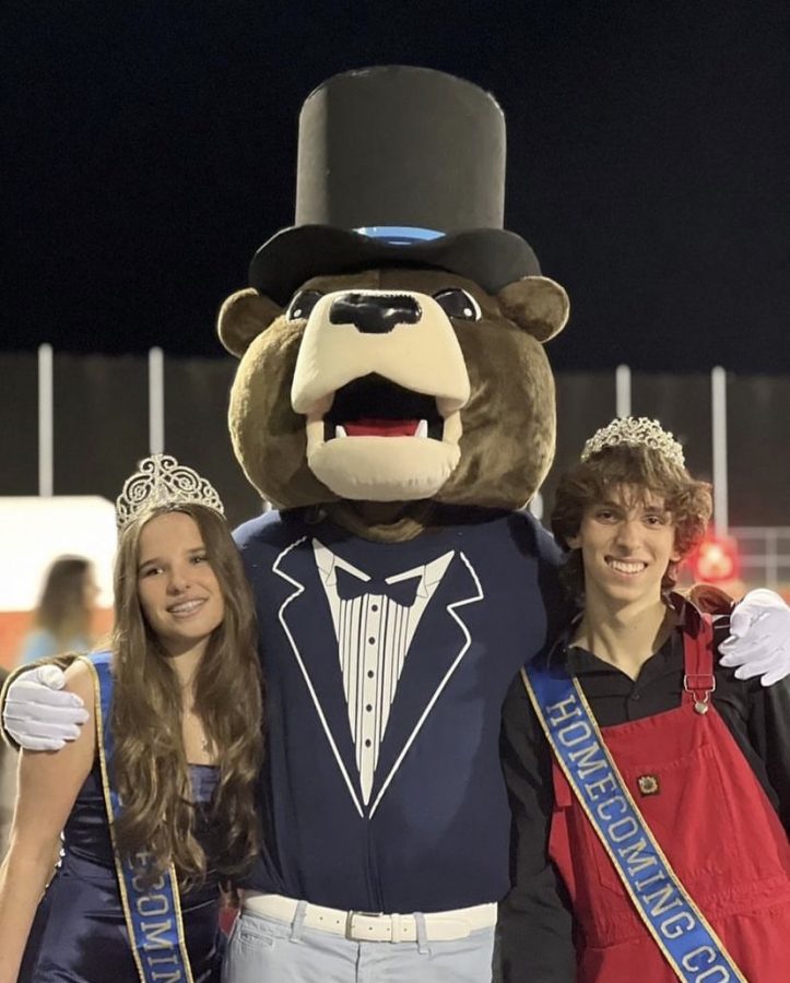 Homecoming royalty winning their crowns 