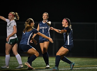 Two freshmen Brynn Udo and Avery Draper celebrate after a goal in a game vs. Emerald Ridge