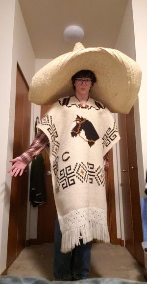 Blake Lopez in the sombrero and poncho of his Halloween costume.