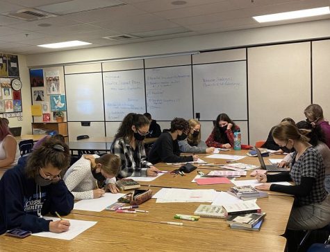 Feminism Club members working on poster to promote the club at the beginning of last year