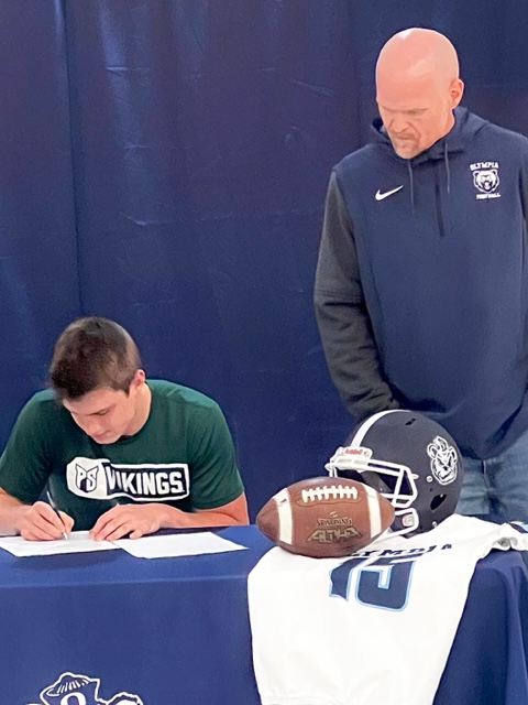 Gabe Downing signs on to play for the PSU Vikings.