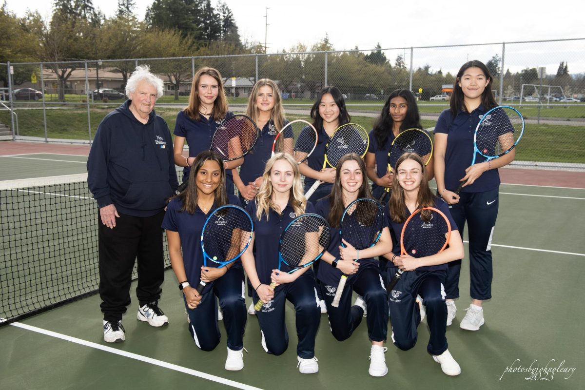 The 2022-2023 Varsity Girls Tennis team posing for a team picture. Photo courtesy of John O'Leary. 