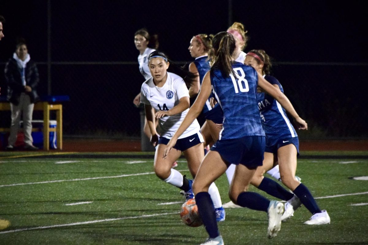 AJ Engelken pursues the soccer ball during a triumphant game against Bellarmine High School.