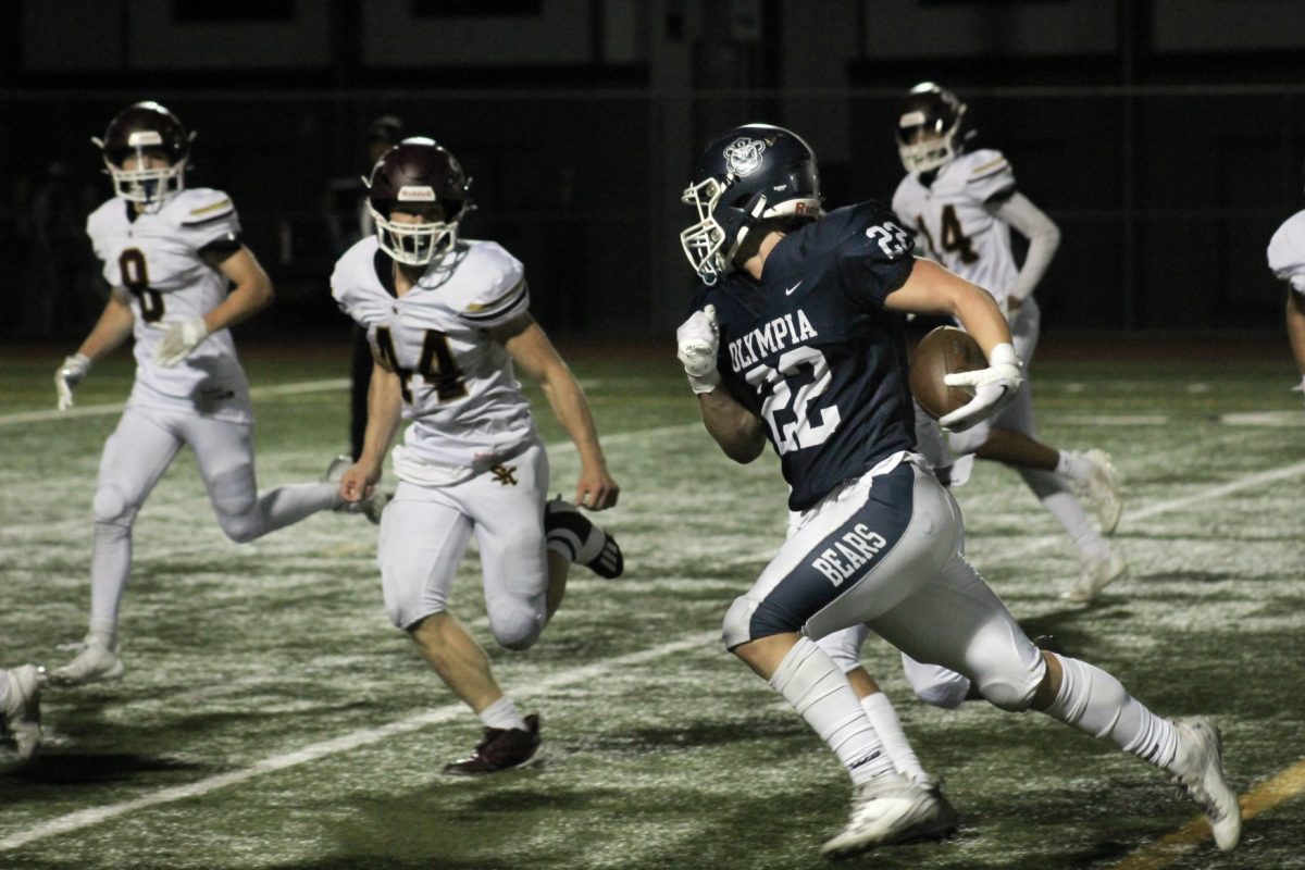 Kaden Fox drives fearlessly towards the goal line. 