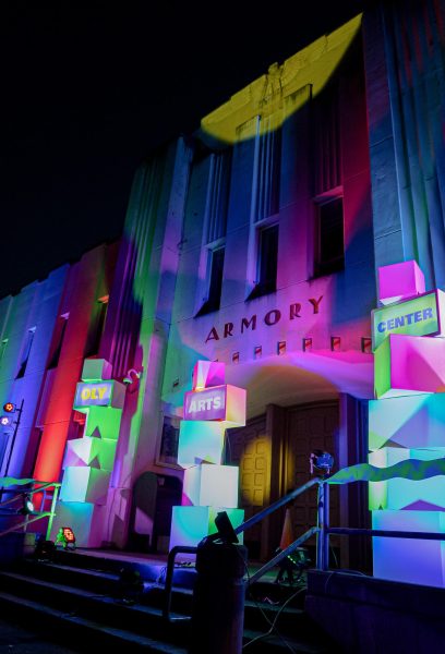 The Old Armory building Illuminated in bright colors to celebrate the new use of an aged structure.