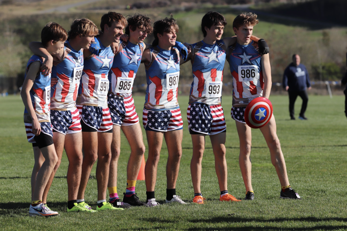 The varsity boys cross country team at Districts in their snazzy Captian America  outfits. 