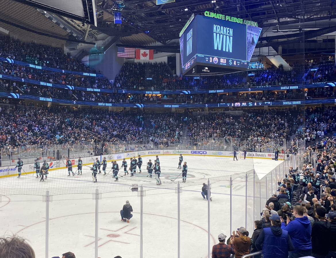 Post-game celebration of a 4-3 victory by the Seattle Kraken over the Edmonton Oilers. 