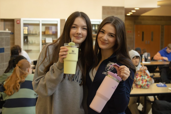 Freshmen Eliza Mackison and Teagan Decou showing off their Quencher H2.0 FlowState and IceFlow Flip Straw tumblers during lunch. 