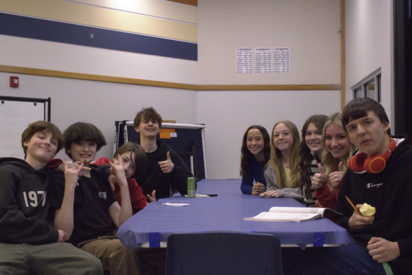 Cleo, Avery, Elijah, Spencer, Ella, and Cressa gathering at the Friendship table during first lunch.