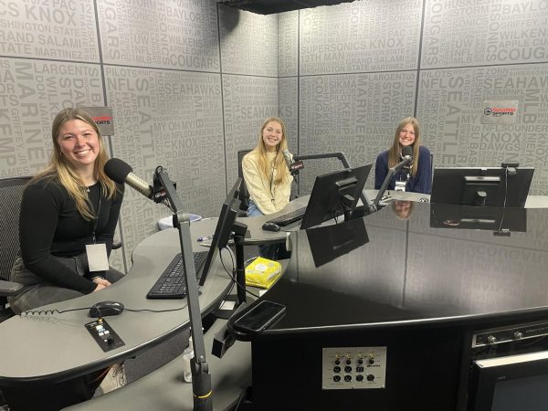 Sydney Potvin, Blayke Warner, and Sami Potvin sit in the recording studio at Seattle Sports Radio. Photo courtesy of Cathy Cangiano.
