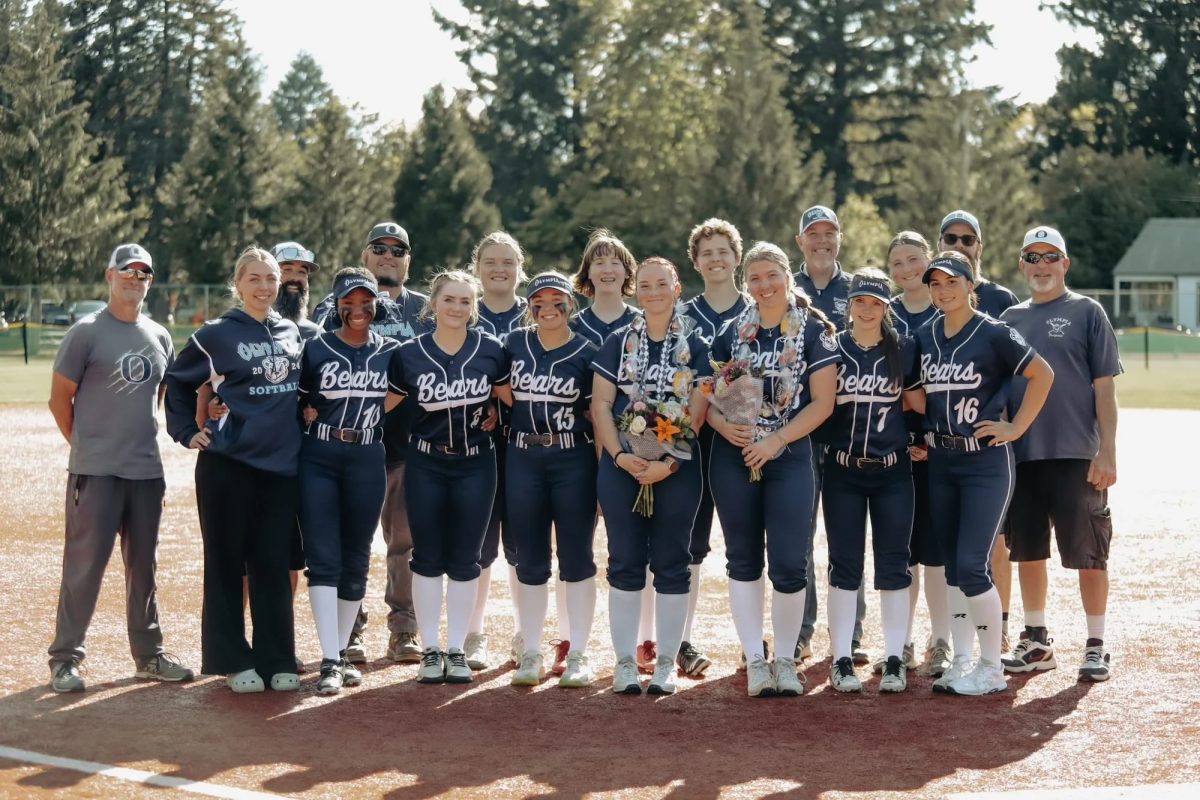 The entire teams honors their seniors Alex and Sami on Senior Night. Photo courtesy of Sirie Chhen.