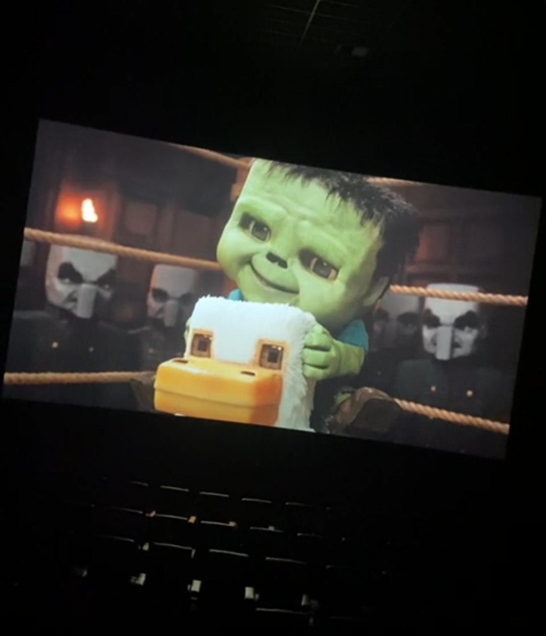 The theater builds up anticipation as the audience gets ready to holler the viral meme.
