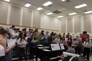 Olympia High School’s Symphonic Choir rehearses “Africa” by Toto, one of the many fun songs that will be performed at their concert on June 5. 