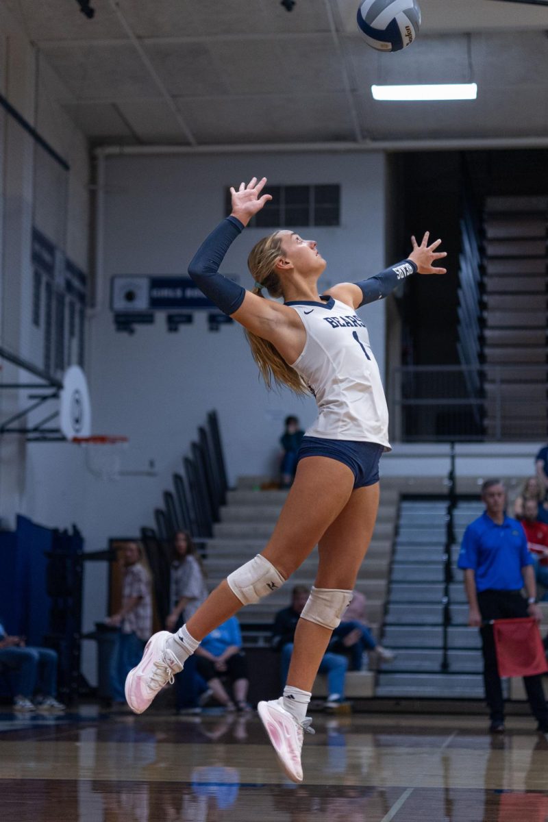Sophomore Stella Sheeran rises for the serve in the second match against Emerald Ridge.