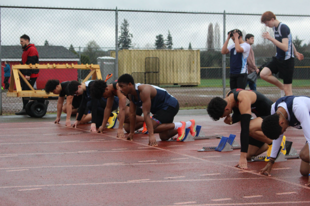 Ibrahima Diallo looks down the track, visualizing his race from the blocks. A phenomenon known as “trackflation,” resulting from unprecedented volumes and quantities of performances from high school athletes, has made track scholarships increasingly difficult to obtain.