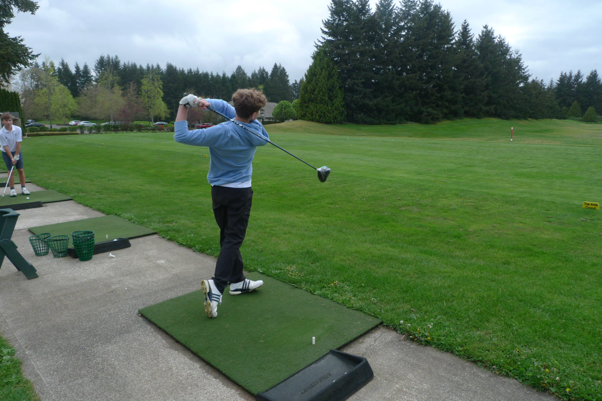 Tiernan Livingston works on his power as he practices his driver skills.